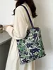 Bolsa de Lona Estampada de Nicho Versão Coreana 2026 Bolsa de Ombro de Grande Capacidade Bolsa Tote Bolsa de Braço Bolsa de Mão Versátil para o Dia a Dia