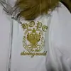 Chamarra con capucha de pelo blanco estilo millennial con letras de pedrería de corona dorada, top cárdigan acanalado de ajuste ceñido con doble cremallera
