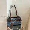 Elegante Bolso de Axila para Mujer 2025 Nuevo Modelo Bolso Baguette de Lujo Ligero de Nicho para el Trabajo y los Viajes Bolso de Hombro Mate Vintage