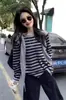 Top de Patchwork de Lujo con Rayas Grises Estilo Francés para Mujer Otoño 2025 Nuevo Tejido de Punto con un Diseño Único