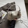 2026 Nuevo Bolso de Mano Tofu de Alta Apariencia Simple de Moda Bolso Cruzado Versátil con Cadena Elegante Casual para el Trabajo