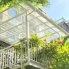 Toldo de aleación de aluminio resistente a impactos para PC, adecuado para tejados de villas, que proporciona sombra y protección UV para uso en exteriores, y que también sirve como cochera de aleación de aluminio.