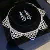 Aretes y collar de dos piezas con colgante de flor y gota de agua incrustados con diamantes, cadena para la clavícula de moda y exquisita, joyería de lujo ligero y de alta gama para mujer