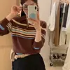 Suéter de punto con diseño de cremallera y solapa a rayas de manga larga para mujer, nuevo suéter casual de estilo perezoso para otoño e invierno 2026