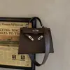 Nuevo bolso de mano vintage Kelly para mujer, bolso cruzado, bolso para ir al trabajo, bolso de hombro simple y elegante para mujer