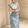 Nuevo vestido cheongsam de verano 2026, retro chic y elegante, estampado, con calados, corte ajustado, estilo chino, largo