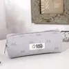 Estojo de Lápis Armazenamento com Laço Bordado Estilo Ins, Nova Bolsa de Maquiagem de Grande Capacidade e Alta Aparência Bolsa de Armazenamento para Meninas e Estudantes