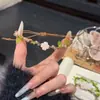 Pulsera tejida a mano de trébol de cuatro hojas, estilo nuevo 2025, estilo Ins, nicho, fresca y brillante, pulsera de amistad para parejas para mujeres, verde
