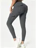 Moda europea y americana transfronteriza versátil multi-bolsillo costuras de herramientas elástico cintura alta cadera ajustada pantalones deportivos fitness yoga