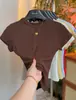 Camiseta Sencilla de Color Sólido con Cuello Redondo y Manga Corta para Mujer 2026 Estilo Coreano Moda Ajustada Top en Rojo Ankara