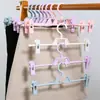 Estante multifuncional para colgar pantalones de almacenamiento en casa, percha para ropa interior, faldas, pinza para pantalones, percha retráctil de plástico, antideslizante, sin costuras