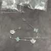 Marca de Luxo High-End Pulseira de Trevo de Quatro Folhas Redondo em Forma de Diamante, Flor de Quatro Pétalas, Flor de Cinco Pétalas para Mulheres, Madrepérola Branca, Madrepérola Rosa, Modelo Popular, Vendas Diretas por Transmissão ao Vivo