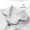 Pijama de forro polar para niños, nuevo estilo otoño/invierno, cárdigan de manga larga, corte holgado y cálido, adecuado para niños mayores, diseño de dibujos animados