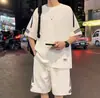 Traje deportivo casual para hombre 2026 verano moderno talla grande corte holgado conjunto de dos piezas con camiseta de manga corta a rayas y pantalones cortos