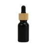 Botella Negra de Aceite Esencial 100ml Tapa de Bambú Vidrio Plástico Cabezal Gotero Botella Vacía Botella Dispensadora de Cosméticos Moderna Elegante