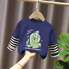Camiseta de Manga Larga para Niños Ropa de Otoño Capa Base 2026 Nuevo Estilo Top de Retazos Rayado Atractivo Falso Dos Piezas Ropa para Niños