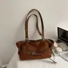 Bolsa Tote de Mão Retro Nicho Estilo Coreano da Moda para Mulheres Nova Coleção Outono e Inverno 2025 Bolsa de Ombro Versátil Tendência Bolsa de Axila