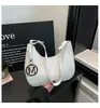 Bolso de media luna tejido estilo francés 2026, simple y versátil, con un tacto elegante y de alta calidad, adecuado para llevar como bolso de mano, bolso de hombro o bolso de axila para el día a día.