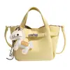 Bolsa de balde de cor sólida minimalista de nicho, novo modelo de alta qualidade, bolsa de mão doce e estilosa, bolsa da moda para mãe e filha