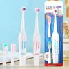 Escova de dentes elétrica criativa escova de dentes elétrica adulta escova infantil automática virá pin conjunto de cartão de sucção de presente conjunto de três atacado