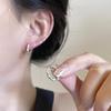 Aretes de aro liso exagerados europeos y americanos para mujer temperamento nicho de lujo ligero aretes de alta gama aguja de plata 925 aretes de gran venta al por mayor