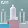 Botella plana de 250 ml de plástico PET tapa Qianqiu Botella para loción champú cuidado de la piel leche corporal cosméticos para rellenar