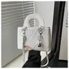 Bolsa Francesa de Nicho de Luxo Leve Feminina 2025 Nova Popular Bolsa Transversal de Ombro High-end Estilosa Portátil Bolsa Daffy