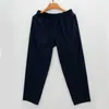 Pantalones deportivos de pierna recta de alta gama de nailon-spandex, pantalones de nueve puntos, pantalones largos, elásticos, de secado rápido, sin arrugas, pantalones casuales de pierna curva para hombre