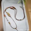 Nuevo Accesorio de Collar Largo de Cristal Étnico Estilo Chino para Mujer, Cadena Versátil de Suéter de Moda, Joyería Transfronteriza