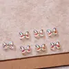 Joias para Nail Art Mini Laço Aurora Resina Pequena Gravata Borboleta Flutuante Acessórios para Unhas Material DIY Pequenos Acessórios
