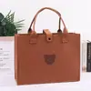 Bolsas de fieltro tipo tote de oso de peluche, hechas a medida y de gran capacidad, adecuadas para eventos corporativos, banquetes de negocios y como bolsas de regalo de fieltro portátiles; impresión de logo disponible