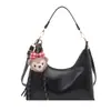 Bolso de Hombro Retro Coreano con Forma de Media Luna 2025 Invierno Estética Personalizada Diseño Simple de Nicho Bolso de Hombro Cruzado