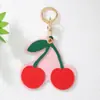 Chaveiro de Frutas Fofo Cereja Maçã Pêssego de Couro com Pingente Capa Protetora para Airtag Charme de Bolsa Venda Quente Transfronteiriça