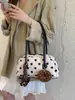 Envío transfronterizo de bolsos de lunares estilo coreano, bolsos de mano para el trabajo para mujer, bolsos pequeños exquisitos, bolsos cruzados, bolsos de hombro pequeños de nicho con diseño único
