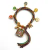 Pulseira do deus da riqueza de cinco vias estilo Xizang oito santos padroeiros cinco mestres Manjushri deus da riqueza amarelo thangka corda tecida à mão pulseira do ano desta vida