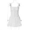 Vestido de tirantes corto plisado de color liso con diseño de botones, estilo dulce, ajustado, nuevo, transfronterizo, europeo y americano