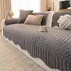 Cojín de sofá de felpa color crema invierno 2026 nuevo forma irregular cojín de asiento antideslizante resistente a los arañazos de gato funda de tela de una pieza toalla al por mayor