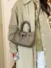 Bolsa Saco Plissada Versátil de Moda Simples para Mulheres 2026 Nova Popular para Trabalho e Dia a Dia Bolsa de Ombro Único Transversal