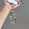 Pulsera de Perlas Estilo Xiaohongshu con Delicado Moño de Flor, Borlas Versátiles Personalizadas, Cadena de Teléfono de Alta Gama