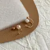 Aretes de Clip Cruzados de Perla Brillante para Mujer Sin Perforaciones, Brazaletes para Orejas de Diseño Nicho, Nuevos Pendientes de Lujo 2026
