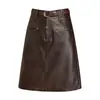 Falda Media de Cuero PU Simple y Elegante para Mujer Otoño/Invierno 2026 Nueva Cintura Alta que Cubre la Cadera Longitud Media Elegante Versátil Bodycon