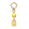 Amuleto estilo INS gato de la suerte de cerámica flor de ciruelo llavero colgante metálico decoración para bolso para buena suerte y salud