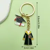 Llavero colgante para graduación, traje de graduación, gorro de licenciado, aleación nueva, transfronterizo, colgante de flor para temporada de graduación estudiantil, regalo pequeño