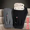 Pantalones casuales de cachemir de otoño e invierno para hombre, pantalones deportivos holgados de talla grande gruesos con forro polar, pantalones cálidos rectos con cordones en los tobillos