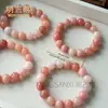 Venta al por mayor del fabricante Pulsera de Flor de Durazno Original de Xinjiang Natural Jade Oro Seda Jade Flor de Durazno Relleno Polvo de Cristal Rosa