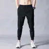 Calças masculinas de corte reto, novo estilo outono 2026, calças de moletom esportivas de corte solto, calças casuais forradas de fleece para inverno para adolescentes