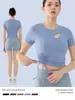 Traje de Yoga de Alta Gama de Manga Corta para Mujer Primavera y Verano Top Deportivo con Almohadilla en el Pecho Cordón Ajustable Corte Entallado Adelgazante Traje de Entrenamiento Fitness