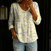 Nova camisa feminina transfronteiriça estampada de manga longa com botões e decote em V, elegante e estilosa para o trabalho, blusa casual única e da moda