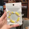 Libro Caperucita Roja Mismo Estilo Estudiante Pulsera de Glaseado de Palomitas de Maíz Hecha a Mano con Cuentas Dibujos Animados Cristal Pulsera Infantil Venta al por Mayor Cajas de Regalo