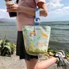 Venta al por mayor del fabricante Bolso de mano artístico de moda Bolso de lona Bolso tipo cubo de gran capacidad para mujer 2026 Nuevo Bolso para almuerzo de trabajo